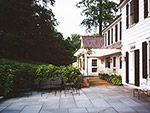view across rear stone terrace