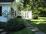 path, fence and gate from service entrance to rear gardens