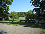 view front house front to country lane and bridge