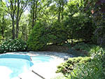 swimming pool tucked into hillside