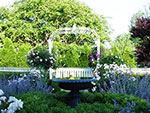 opposite arbor with screening behind fence