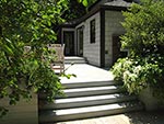 steps at upper living and kitchen level