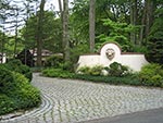 main property entrance with stucco walls