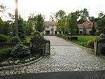 stone pillars, belgian block and iron gate