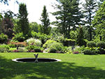 black pool set flush into lawn