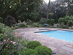 pool with double steps and waterfall