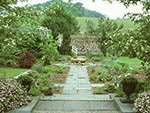 view to hillside above first garden