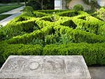 boxwood edged front entrance beds